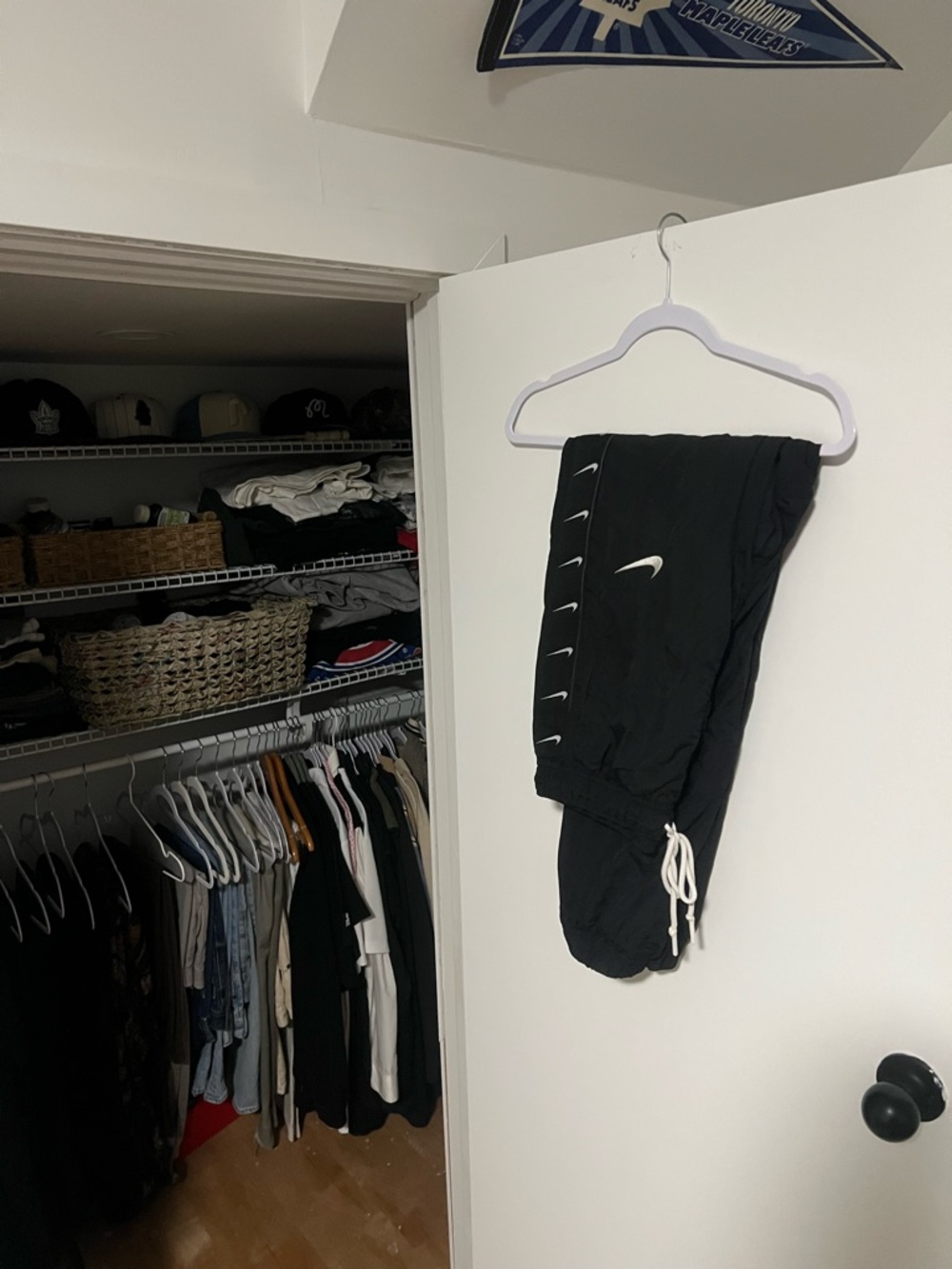 Nike Black Jogger Pants with White Swoosh Accents